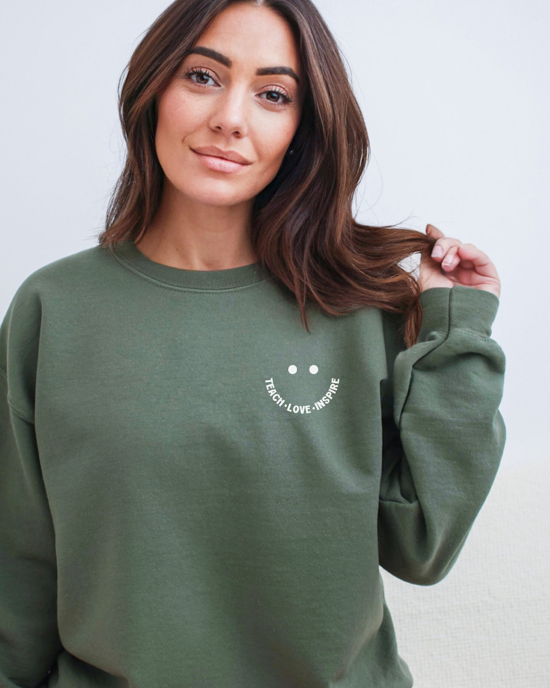 Teach Love Inspire Sweatshirt